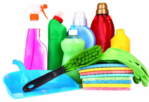 Carpet cleaning team preparing equipment safely before work begins