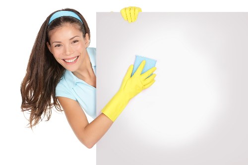 Carpet cleaning team working safely in a Fulham property
