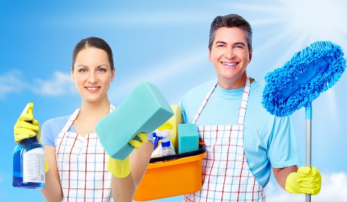 Deep cleaning a sofa in a Fulham living room